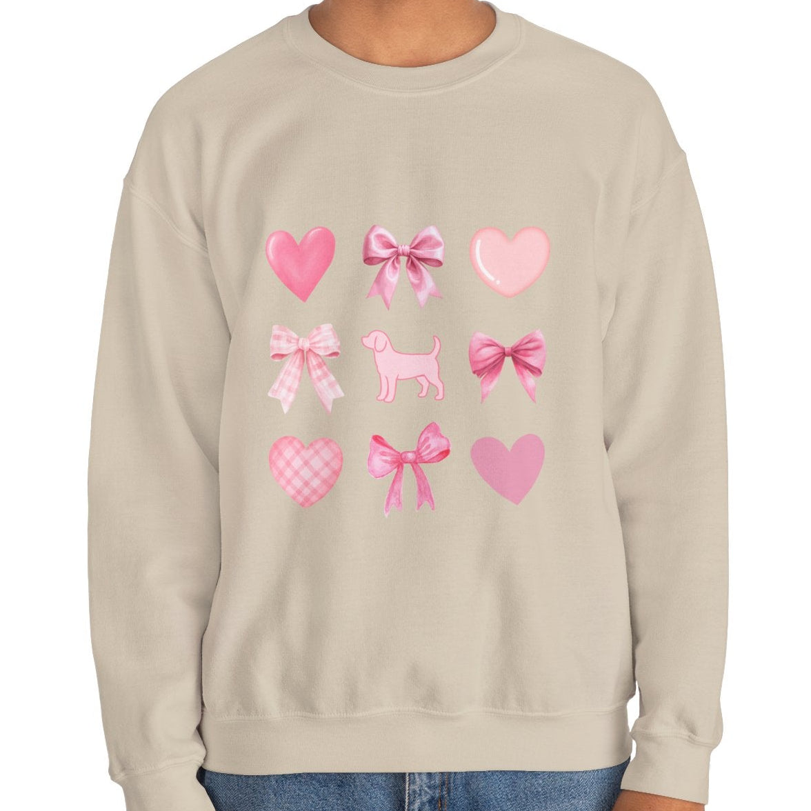 Front view of sand color unisex sweatshirt with heart, bow, beagle design on male model