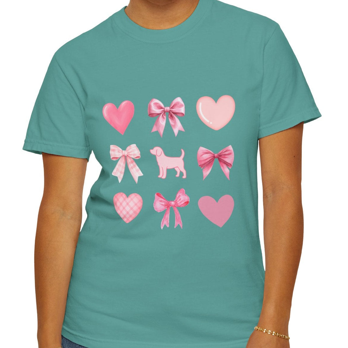 Front of seafoam short sleeve shirt with pink hearts, bows, and a beagle graphic