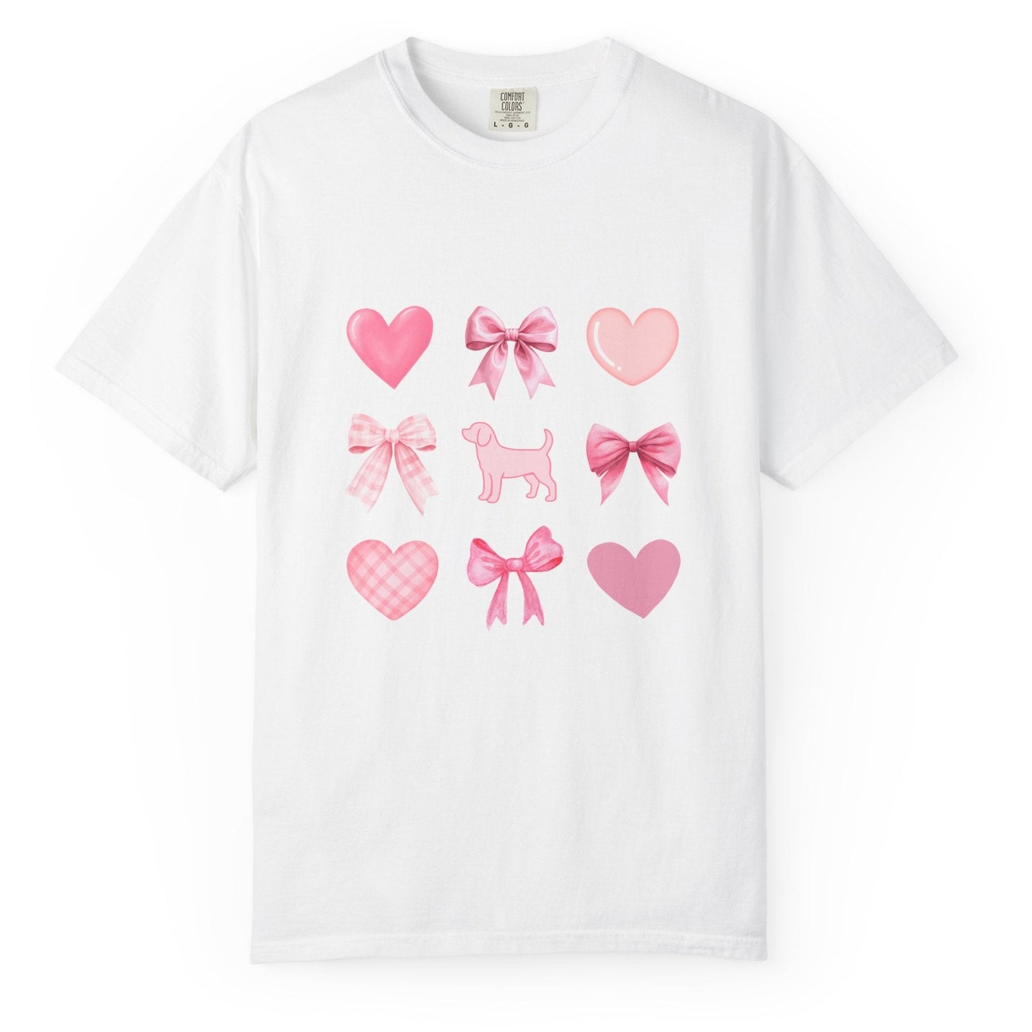 Front of white short sleeve shirt with pink hearts, bows, and a beagle graphic